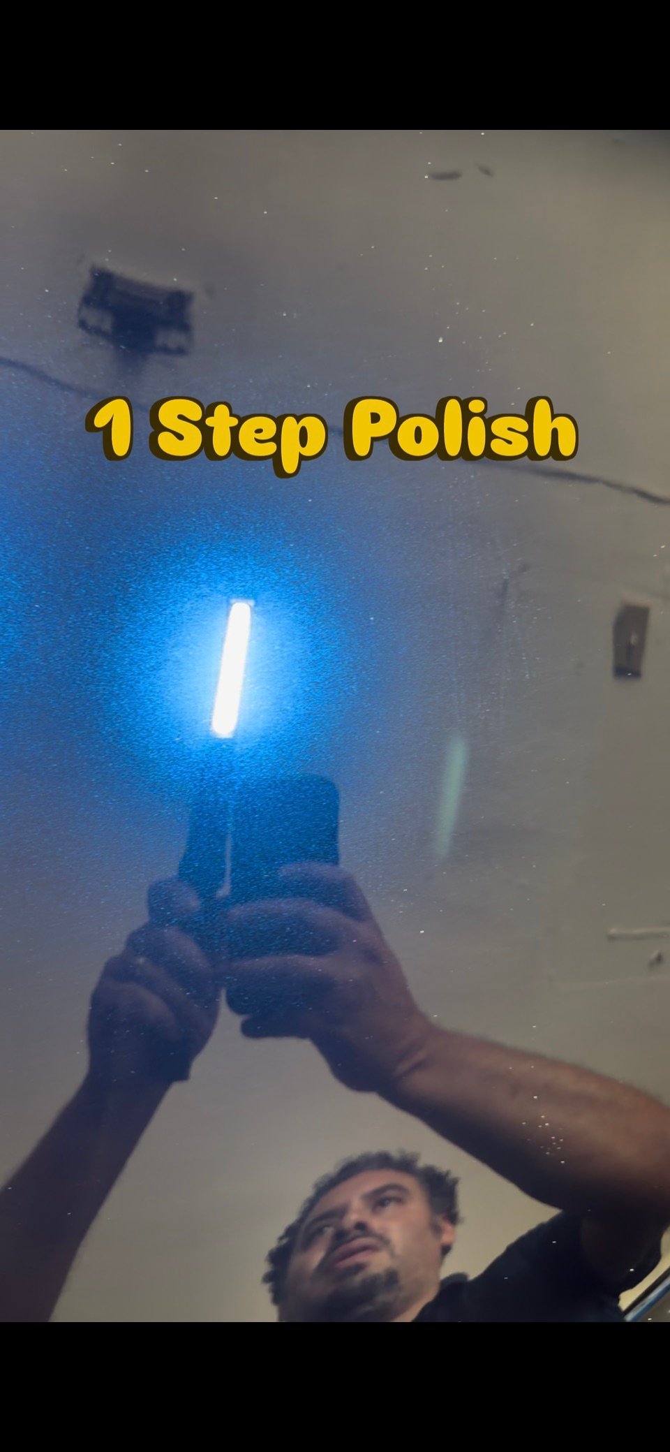 Paint finish reflecting an inspection light after a one-step polish