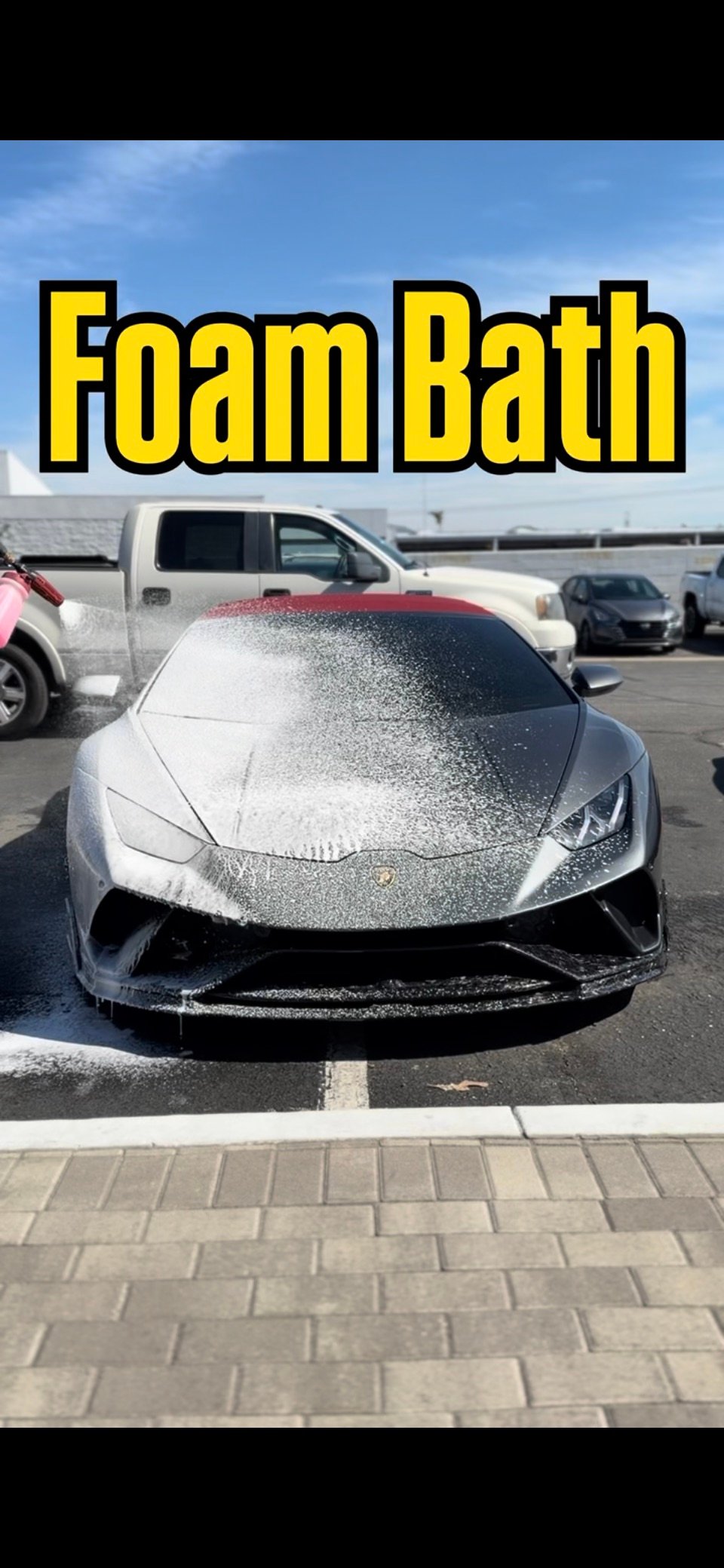 Lamborghini receiving a foam wash from 67 Details