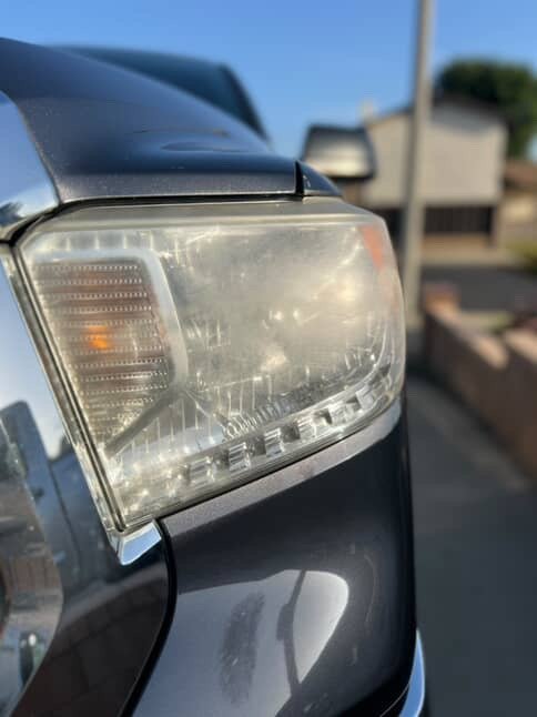 Cloudy headlight lens before restoration